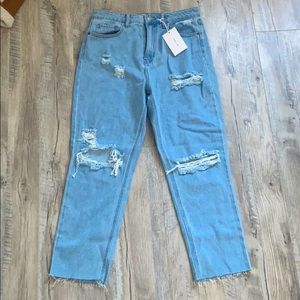 Distressed boyfriend jeans with raw hem